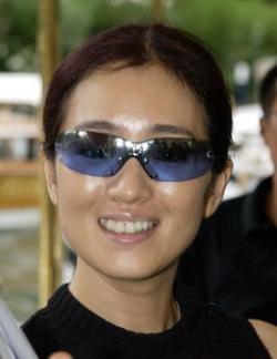 Latest photos of Gong Li, biography.
