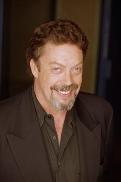 Latest photos of Tim Curry, biography.