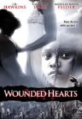 Wounded Hearts is the best movie in Taylor Hawkins filmography.